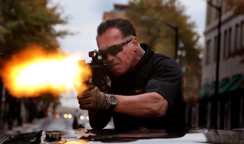 Arnold Schwarzenneger Hates His SABOTAGE Hair Cut (Interview)