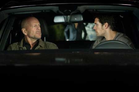 VIDEO: Bruce Willis & Henry Cavill Play Father/Son On The Run In New Movie